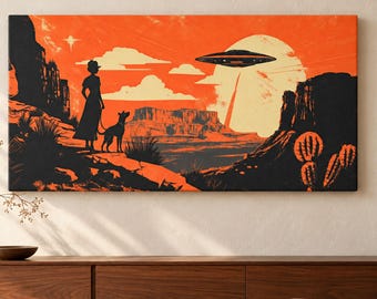 May include: A rectangular wall art print featuring a desert landscape in shades of orange and black. The scene depicts a silhouette of a person standing with a dog, looking toward a large moon and a flying saucer hovering above rocky cliffs.