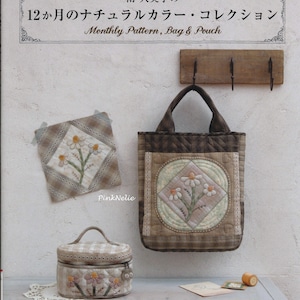 May include: A collection of handmade fabric items, including a tote bag, a small square, and a round case, all featuring daisy flower embroidery. The items are in shades of brown, beige, and green, with a quilted texture. The text "Monthly Pattern, Bag & Pouch" is visible.