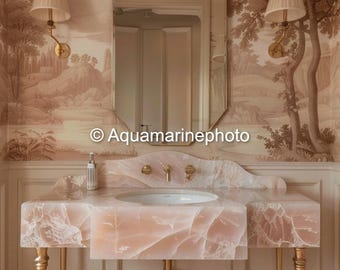 May include: A luxurious bathroom vanity with a pink marble countertop and gold fixtures. The vanity has a built-in sink and is supported by gold legs. The background features a scenic wallpaper and a decorative mirror. The image includes the text "Aquamarinephoto".
