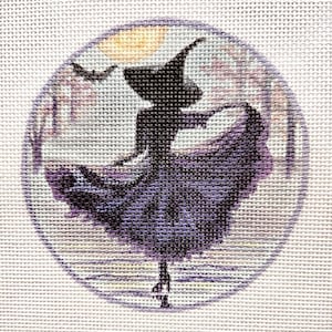 May include: A round needlepoint design featuring a silhouette of a witch in a flowing purple dress and hat. A bat flies in front of a yellow moon. The background has a soft, muted color palette of lavender, gray, and white.