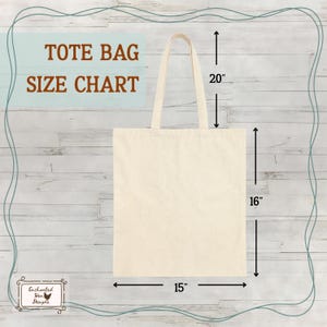 May include: Cream-colored tote bag with dimensions displayed: 15 inches wide, 16 inches high, and 20 inches for the handle. The text "TOTE BAG SIZE CHART" is at the top. The bag is on a light wood-grain background.