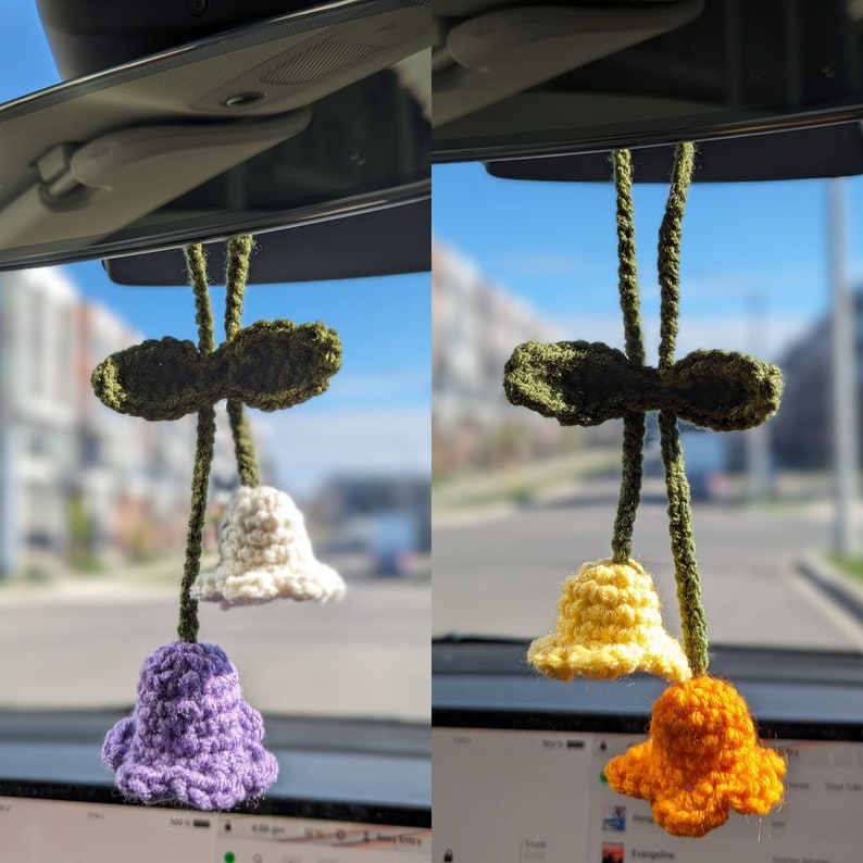 Mixed colour lily of the valley charm hanging on rear-view mirror
