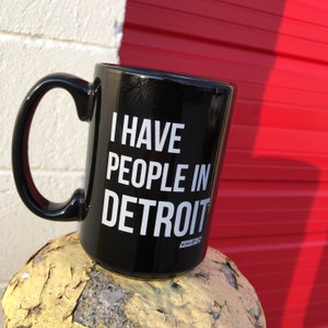 I have people in Detroit Ceramic Mug image 1