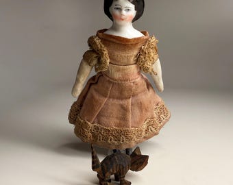 Tiny Antique 3 3/8 Inch China Head Doll With Fancy Hair And Carved Cat