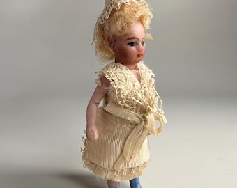 All Bisque Lilliputian Doll – Elegantly Dressed, 2 1/2 Inches Tall
