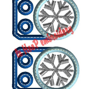 May include: Two embroidered patches featuring a snowflake design. Each patch has a blue rectangular border with three blue circles and a light blue circle with a gray snowflake. The text "le Hoop embroidery" and website address are at the bottom.