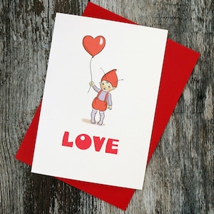 May include: A white card with a red heart balloon, a cartoon elf holding the balloon, and the word "LOVE" in red letters.