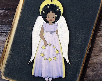 May include: A wooden angel ornament with a halo, wings, and a purple dress. The angel is holding a wreath of yellow stars.