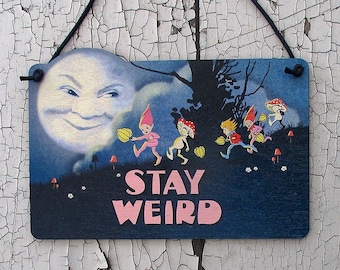 Stay Weird wooden sign