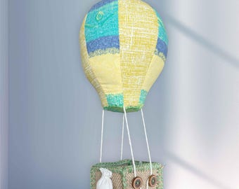 Hangmobiel voor heteluchtballon. Kinderkamerinrichting. Kinderkamer.
