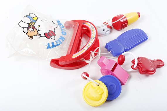Rare Vintage Hello Kitty Baby Toy Bag Comb Whistle Key Coin