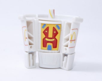 McDonald's, McDino Changeables, vaso de batido de leche Krypto, 1990, McRobots, Transformers, figura de acción, juguete, vintage, coleccionable, ~ 20-01-689