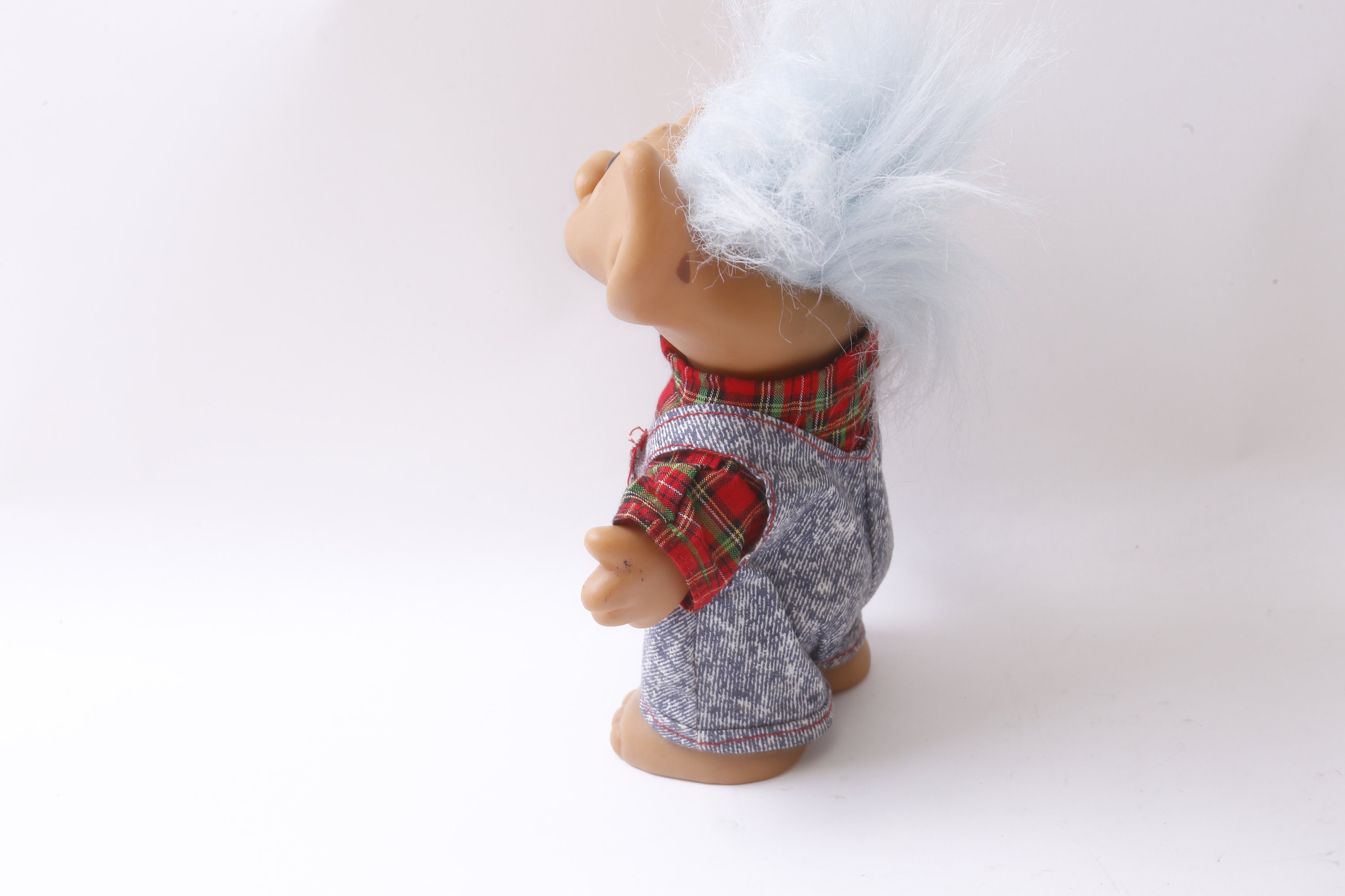 Troll doll with store horseshoes on feet