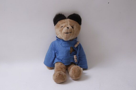 Beertje Paddington Eden blauwe regenjas bruin teddybeer