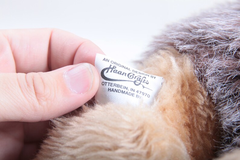 May include: A white tag with black text that reads "An original design by Haan Crafts, Otterbein, IN 47970 Handmade by".