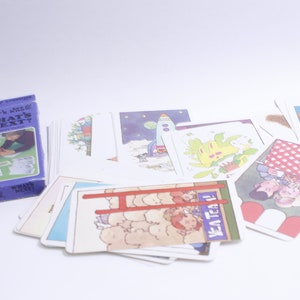 May include: A set of colorful cards with illustrations for a children's game called "What's Next?" The game is designed to help children learn about sequencing and predicting what will happen next. The box is purple and features a cartoon owl.