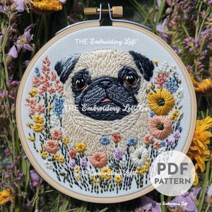 May include: An embroidered pug dog surrounded by colorful flowers in a wooden hoop. The text "THE Embroidery Loft" is visible on the fabric. A "PDF PATTERN" label is in the lower right corner.