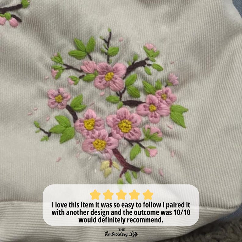 Pode incluir: Um close-up de um tecido branco com flores bordadas de rosa. O tecido tem uma superf&iacute;cie texturizada. O texto "I love this item it was so easy to follow I paired it with another design and the outcome was 10/10 would definitely recommend. THE Embroidery Loft" &eacute; vis&iacute;vel na parte inferior da imagem.