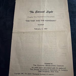 May include: A vintage printed document titled "The Eternal Light," Chapter One Hundred and Seventeen, "THE THIEF AND THE HANGMAN," broadcast on February 2, 1947. Presented by The National Broadcasting Company and The Jewish Theological Seminary of America.