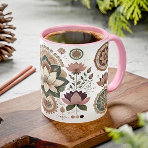 Boho lotus mug featuring an intricate mandala design, perfect for yoga lovers and meditation enthusiasts. This spiritual coffee cup adds a zen touch to any space, making it an ideal gift for yogis and free spirits. High-quality ceramic with a fade-resistant finish, microwave-safe and dishwasher-safe. A unique relaxation gift idea, great for tea, coffee, or matcha lovers who appreciate bohemian and meditative art.
