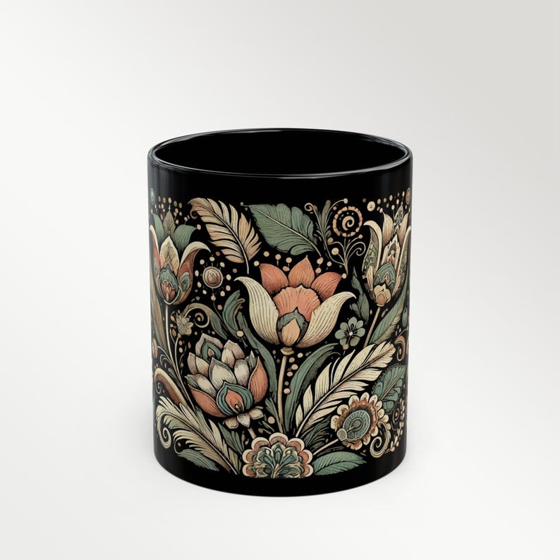 Boho black ceramic coffee mug with tulip floral design, perfect for tea or coffee lovers. Artisan drinkware for vintage-inspired kitchens or bohemian decor. Makes a unique gift for her or a decorative piece for retro and artistic home settings.