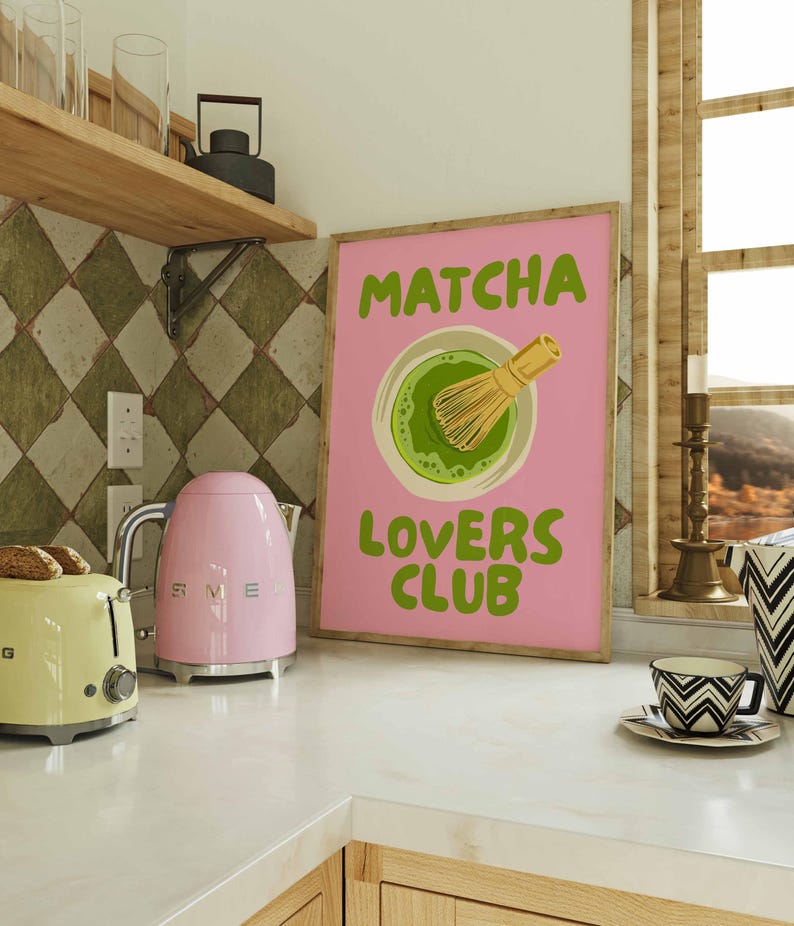 Pink matcha printable wall art featuring Matcha Lovers Club typography with a green matcha bowl and bamboo whisk on a bright pink background, ideal for matcha wall art, matcha print, tea lover gift, kitchen wall art, kitchen print, coffee bar decor, pink wall art, green wall art, cute wall art, girly wall art, dopamine decor and apartment decor.
