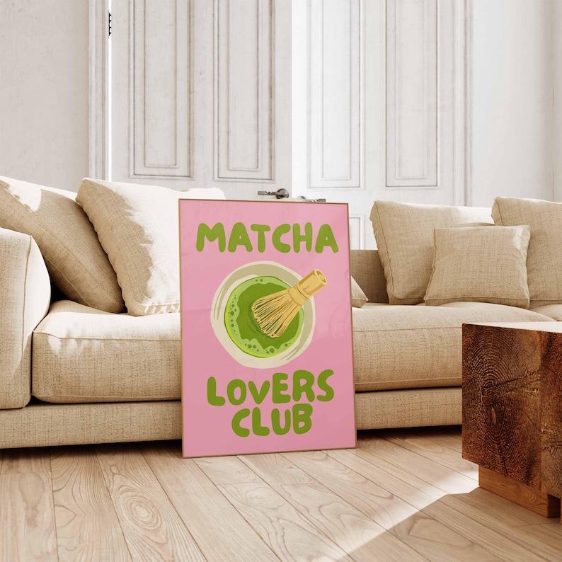 Pink matcha printable wall art featuring Matcha Lovers Club typography with a green matcha bowl and bamboo whisk on a bright pink background, ideal for matcha wall art, matcha print, tea lover gift, kitchen wall art, kitchen print, coffee bar decor, pink wall art, green wall art, cute wall art, girly wall art, dopamine decor and apartment decor.
