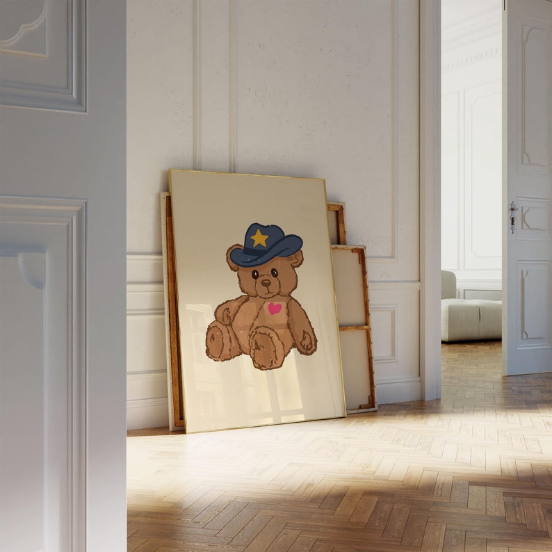 Retro teddy bear cowboy print for nursery or dorm decor, perfect for vintage wall art lovers, Western art themes, and playful apartment wall decor. Printable wall art featuring a cute bear with a cowboy hat.