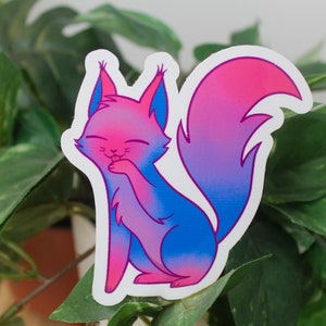 Sticker of a cat with a blue, purple, and pink gradient representing the bisexual flag.