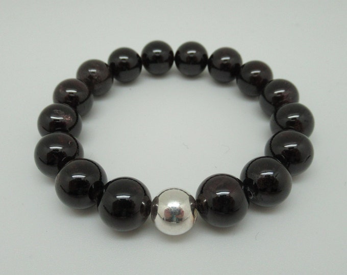 Garnet and sterling stretch bracelet