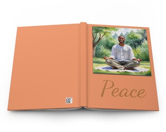 May include: An open book with a watercolor illustration of a person meditating in a green field. The book is peach colored and the text "Peace" is written in gold on the right page.