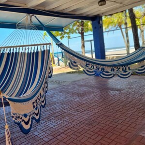 Colorful handwoven hammock nicaragua. They measure 140 inches long in their in-use position by 48 inches wide. The poles are made of cedar. Hammock made of manila cotton thread.