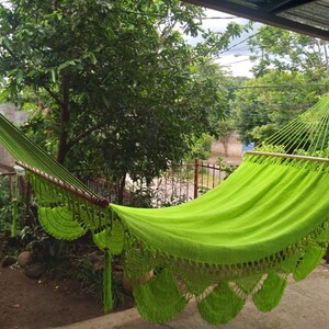 Colorful handwoven hammock nicaragua. They measure 140 inches long in their in-use position by 48 inches wide. The poles are made of cedar. Hammock made of manila cotton thread.