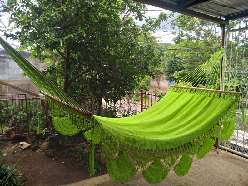 Colorful handwoven hammock nicaragua. They measure 140 inches long in their in-use position by 48 inches wide. The poles are made of cedar. Hammock made of manila cotton thread.