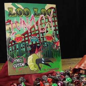 May include: A green and red illustrated book cover with the title "Loo Loo Funacy" and the text "First Edition!"  The cover features a cartoon amusement park with a roller coaster, a Ferris wheel, and a green and black monster with claws.