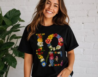 Blooming Love Flower Graphic Tee: Floral Artwork Cotton Apparel
