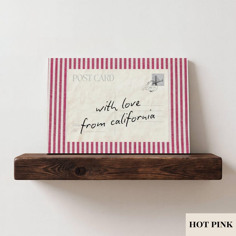 May include: A rectangular postcard print featuring a cream-colored background with the text POST CARD and the handwritten script with love from california. The design is framed by a border of vertical hot pink and white stripes.