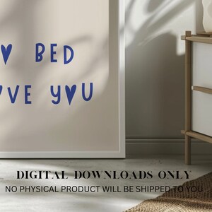 May include: A digital download of a printable wall art design featuring the text "I &hearts; BED I &hearts; YOU" in blue with a white background.