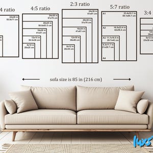 May include: A beige sofa with two cushions is centered below a wall displaying various framed art print sizes, including 11x14 in, 22x28 in, 24x30 in, and 20x25 in. The text indicates the sofa is 85 inches (216 cm) wide.