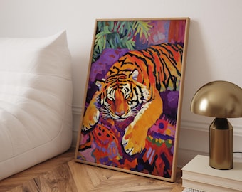 May include: A rectangular framed wall art print featuring a vibrant, painterly depiction of a tiger resting. The tiger has orange fur with black stripes, set against a colorful, abstract background of purple, red, and green tones in a wooden frame.