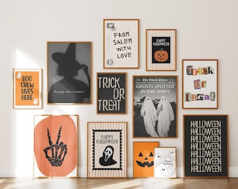 May include: A collection of framed Halloween-themed art prints. The prints feature various designs, including a witch silhouette, a skeleton hand, ghosts, pumpkins, and the phrases "Trick or Treat" and "Happy Halloween". The color palette includes orange, black, and white.