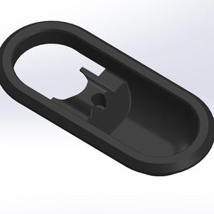 May include: Black plastic door handle with a rounded oval shape and a recessed area for a key.