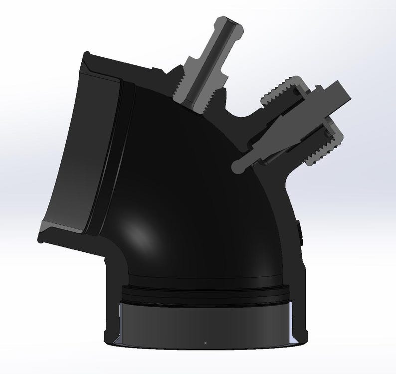May include: A black plastic pipe fitting with a 90-degree angle and a side outlet. The fitting has a threaded connection on the side outlet and a smooth connection on the main outlet.