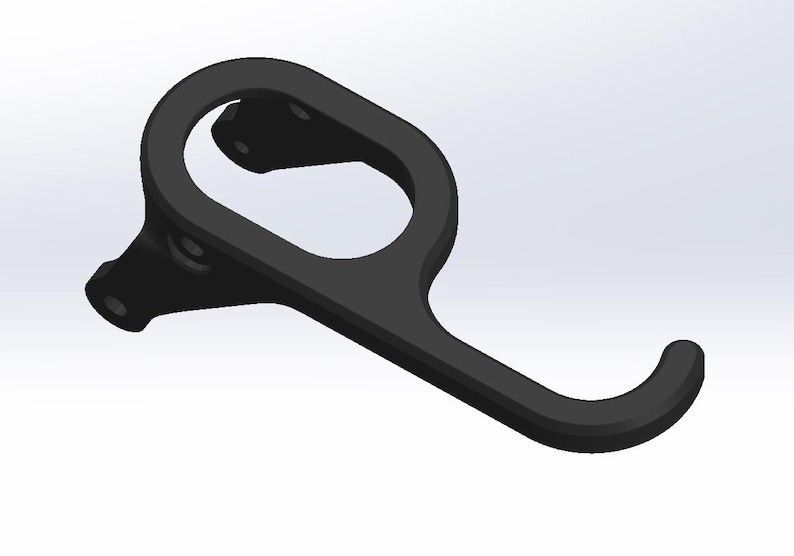 May include: A black plastic hook with a rounded handle and a curved hook. The hook is designed to be mounted on a wall or other surface.