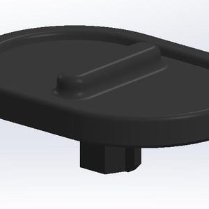 May include: Black rubber plug with a rectangular opening in the centre. The plug has a small, round base.