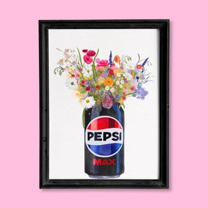 May include: A framed art print featuring a Pepsi Max can filled with a vibrant bouquet of flowers. The can is black with the Pepsi logo in red, white, and blue. The flowers include pink, yellow, and purple blooms.