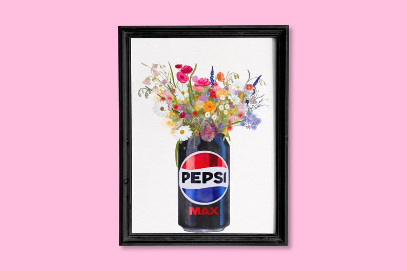 May include: A framed art print featuring a Pepsi Max can filled with a vibrant bouquet of flowers. The can is black with the Pepsi logo in red, white, and blue. The flowers include pink, yellow, and purple blooms.