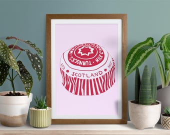 May include: A framed print of a red and white illustration of a Tunnock's Milk Chocolate Caramel Wafer. The illustration is on a pink background. The text on the illustration reads "Tunnock's Milk Chocolate", "Scotland", and "LTD".