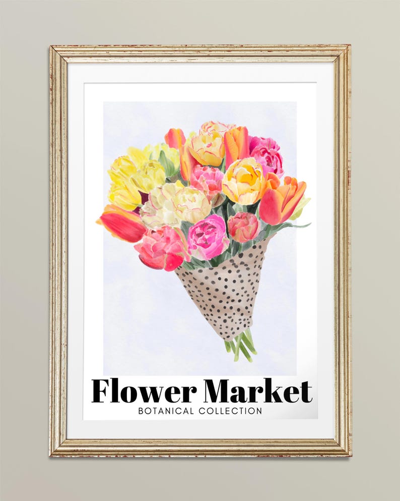 May include: A framed print featuring a watercolor bouquet of tulips in shades of yellow, pink, and orange. The flowers are wrapped in a brown paper cone with black polka dots. The text "Flower Market" and "Botanical Collection" are displayed below the bouquet.