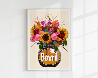 May include: A rectangular art print featuring a vibrant bouquet of sunflowers, pink dahlias, and blue thistles arranged in a dark brown Bovril jar. The jar displays the white Bovril logo with orange accents and small text below, set against a light cream background.